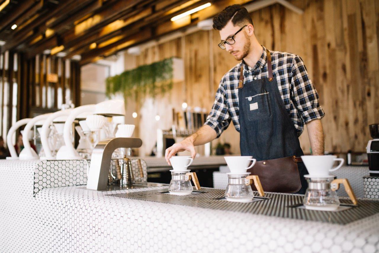 Barrista working whilst standing